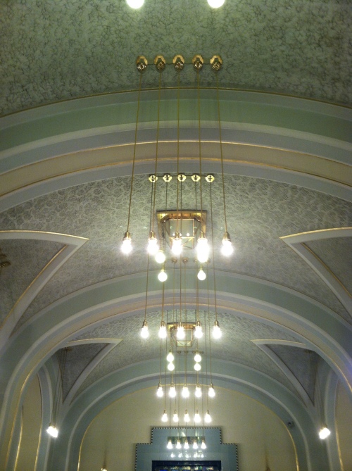 Light fixtures in the basement level. Exposed lightbulbs were considered "fashionable" at the time, and so there are exposed bulbs throughout the Municipal House